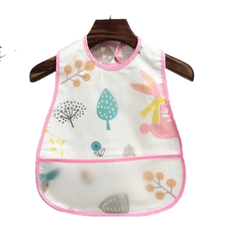 Babador Impermeável Com Bolso Encantaditos